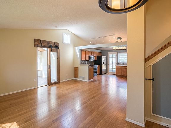 Custom made sliding barn door encloses the sunroom.
