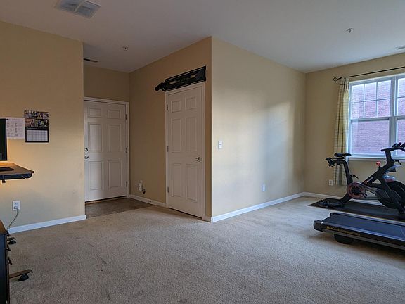 First floor being used for an office and workout area