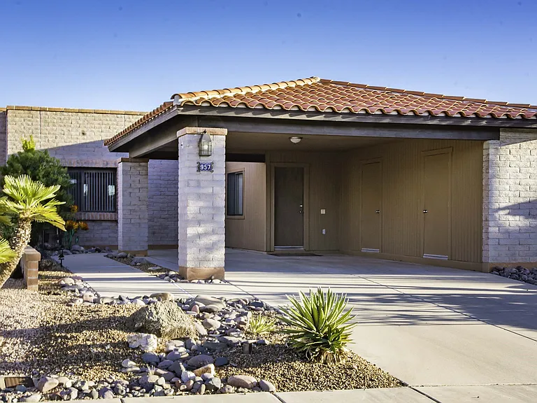 Double carport with 2 storage areas