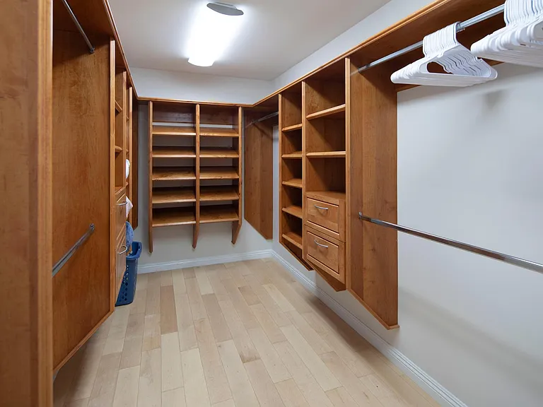 Large primary bedroom walk in closet