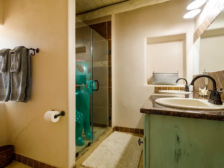 Bathroom w/ Tiled Walk-in Shower, Dual Sinks