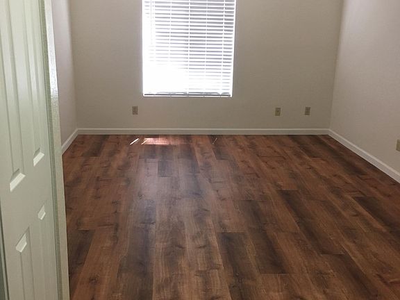 Large master new flooring and blinds