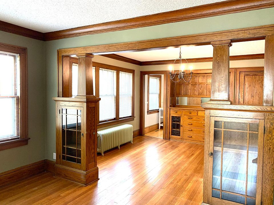 Living Room into Dining Room. New Paint is beige.