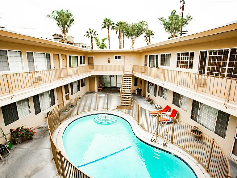 Interior common area of the building with sparkling clean up to 6FT pool and lounge area.