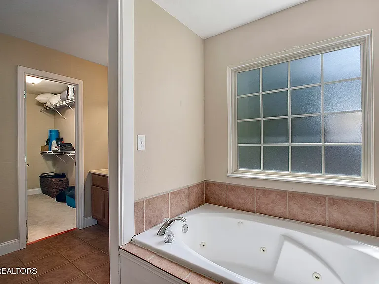Lovely garden tub, plus beautiful new tiled walk-in shower
