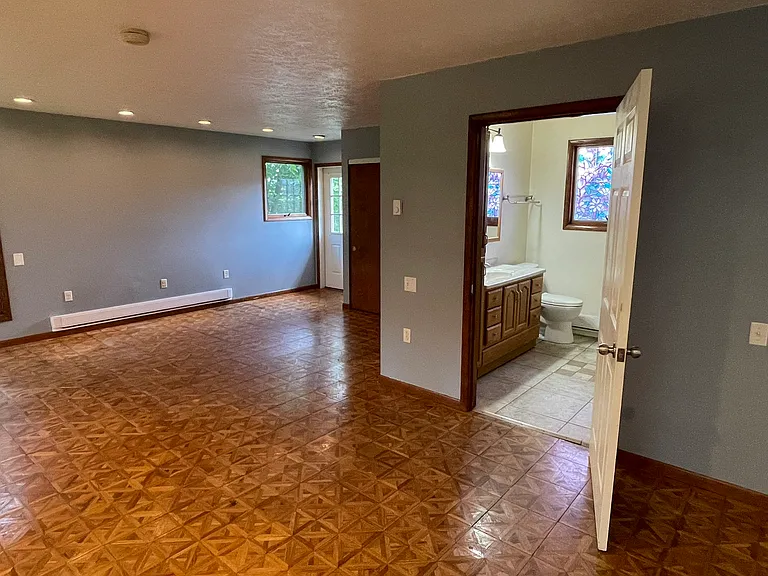 Accessible primary suite with full bath.