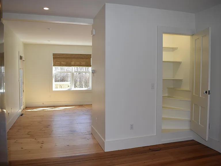 Kitchen Pantry and view of Living & Dining Room for Unit 1.