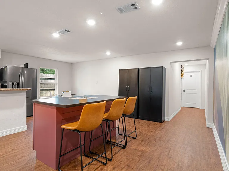 Island for additional storage, seating and gathering.