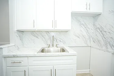 Rented by Norman Raindel, LREB