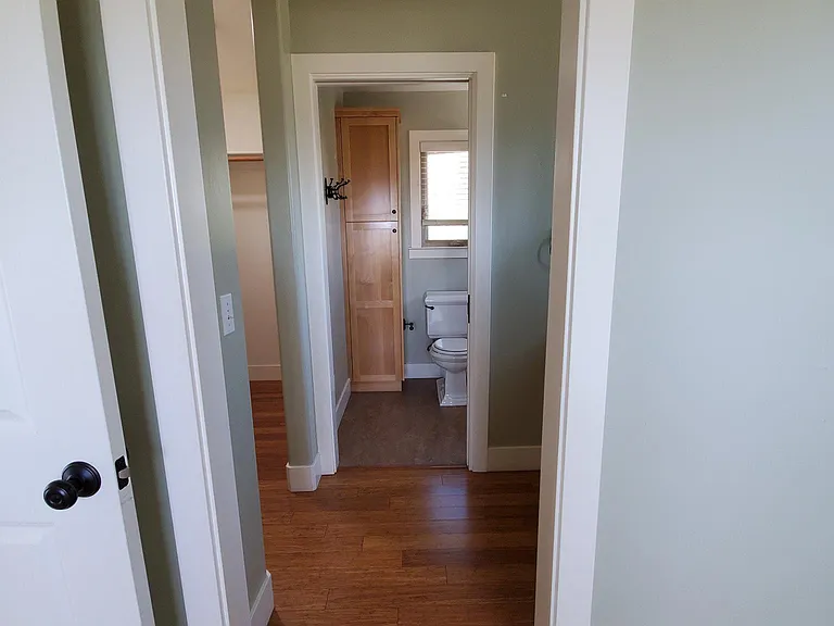 looking into master closet and bath