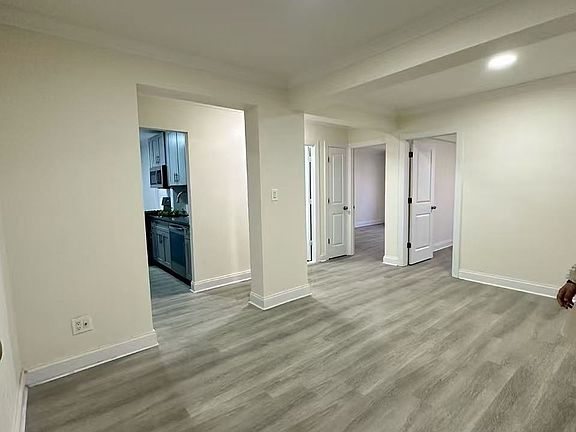 Living room. Completely renovated with durable, easy maintenance composite flooring and fresh paint.