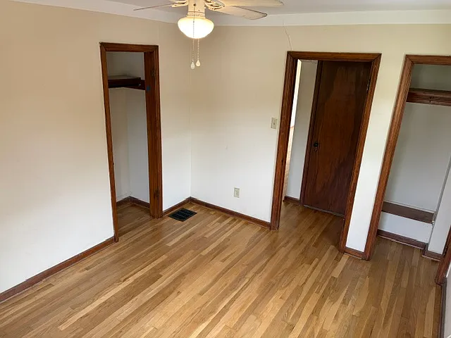Bedroom With Two Closets