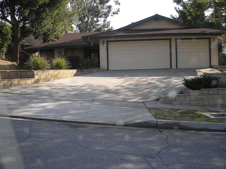 Fronal View/3 Car Garage