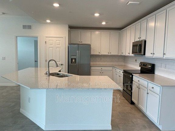 3rd image of 10208 Staggerbush Dr Unit 102