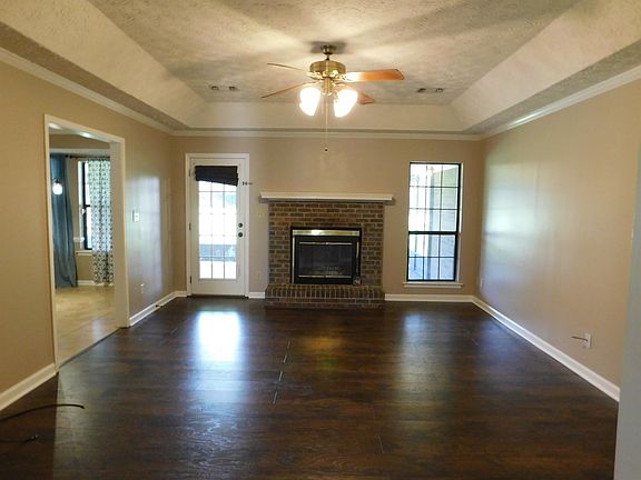 Living Room with trey ceilings