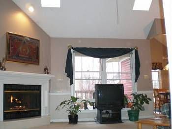 Living Room w/2 Skylights & Gas Fireplace