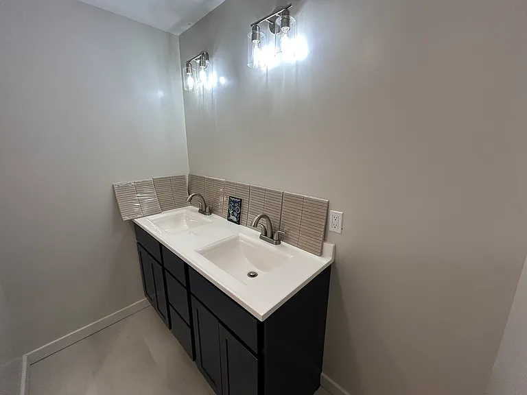 full bath double vanity and tile that is about to be installed