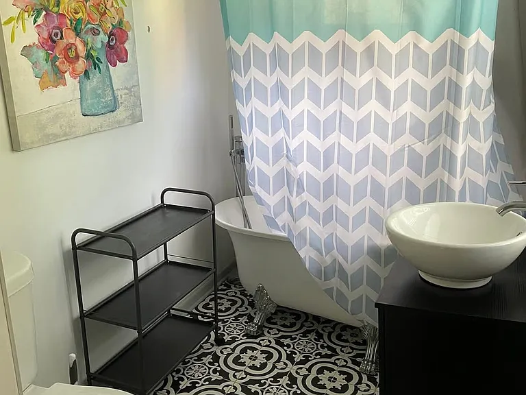 Newer bath with clawfoot bathtub, perfect for relaxing!