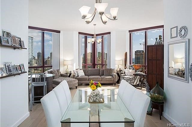 High Ceilings and picturesque views from every vantage point enhance the bright and spacious feeling of this well-appointed home.