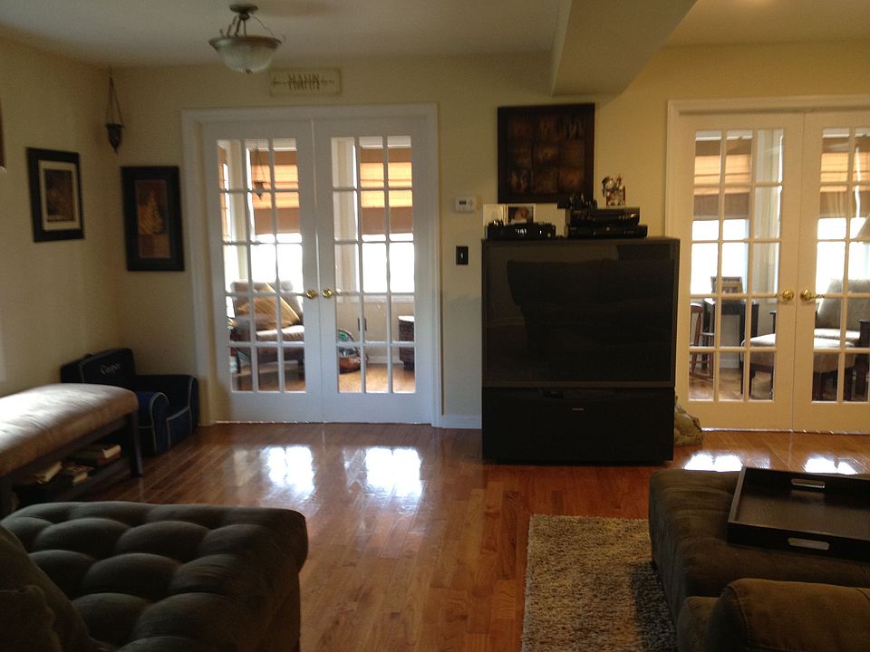 Living Room opens to french doors and reading porch
