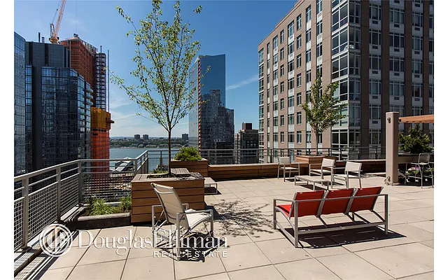 Sold by Douglas Elliman | media 11