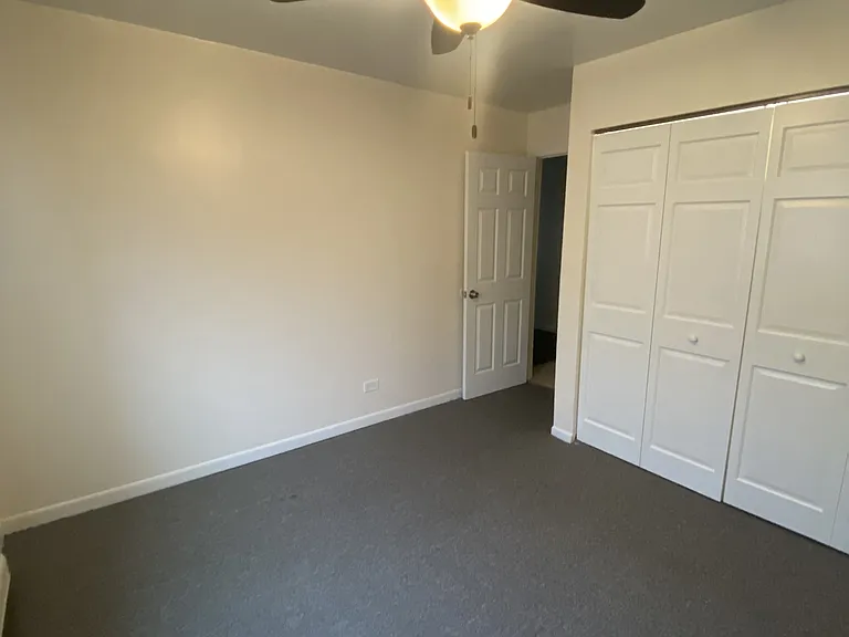 Master Bedroom w/ Hunter Ceiling Fan & Large Closet Space