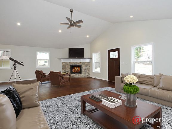 Vaulted Living Room, Fireplace, new wood floors