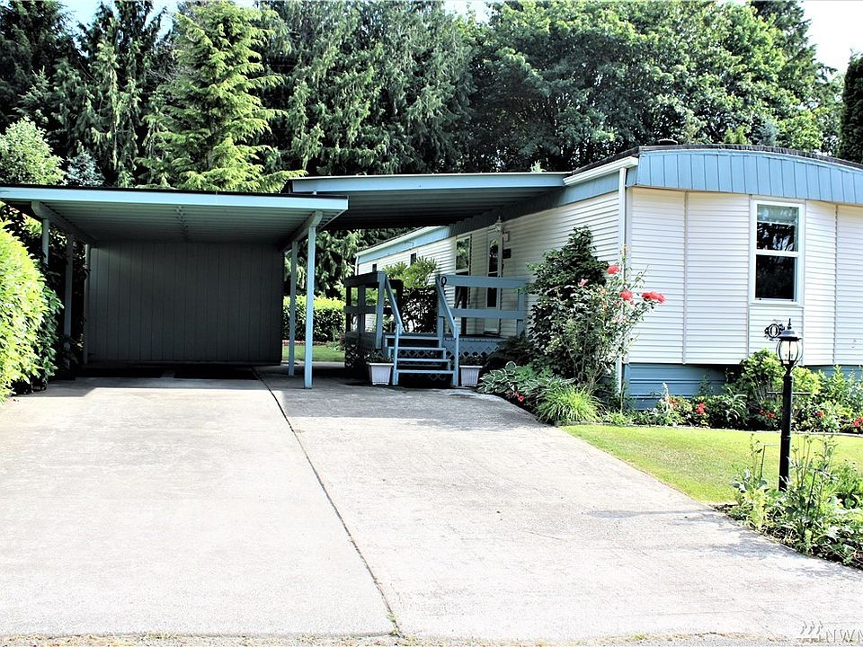 Welcome home to this little charmer. Well cared for yard,. Freshly painted out side. Lots of updates. Central Kitsap, With A/C. 55+ community. Water, Sewer, & Garbage included in space rent. Hurry, & make this your next Home.
