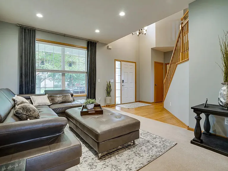 Living room with 2 story foyer