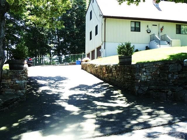 Stone walls, 3 car garage