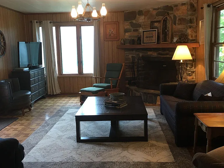 Living Room with Beautiful Stone Fireplace