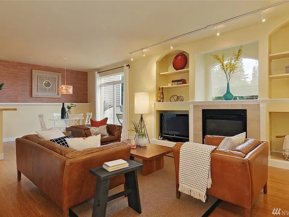 Living room with gas fireplace and built-in shelving