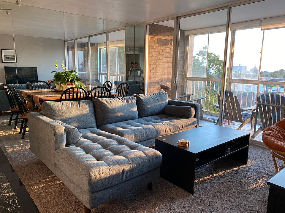 Living room with big wall mirror