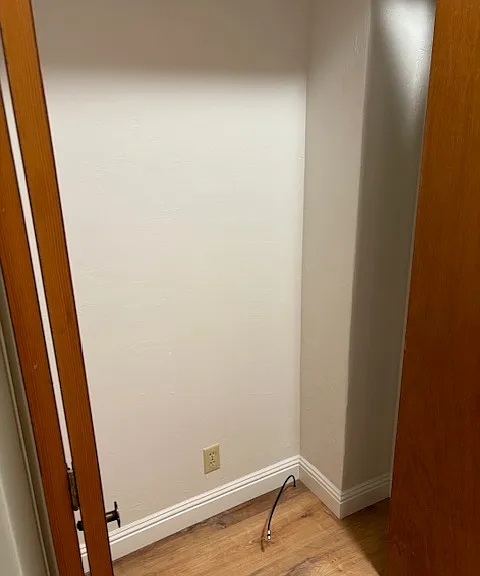 Closet suitable for Wifi/Cable modem hookup with power and cable.