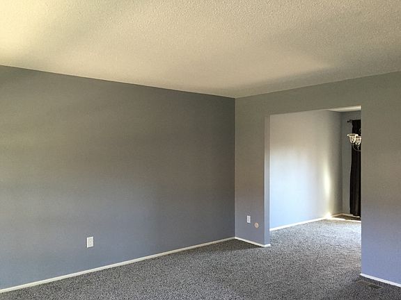 Living Room Opens to Dining