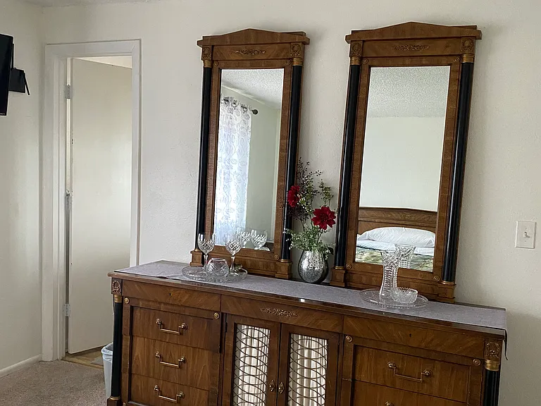 Double dresser with huge top area for keys and everything. Also:
"hidden areas" and room for jewelry, intimates, and all the morning things.