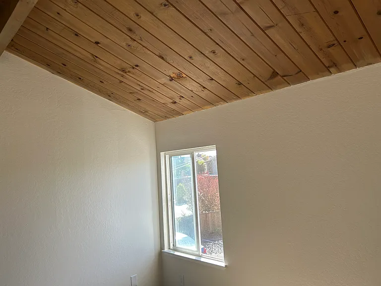 Vaulted ceiling in bedrooms