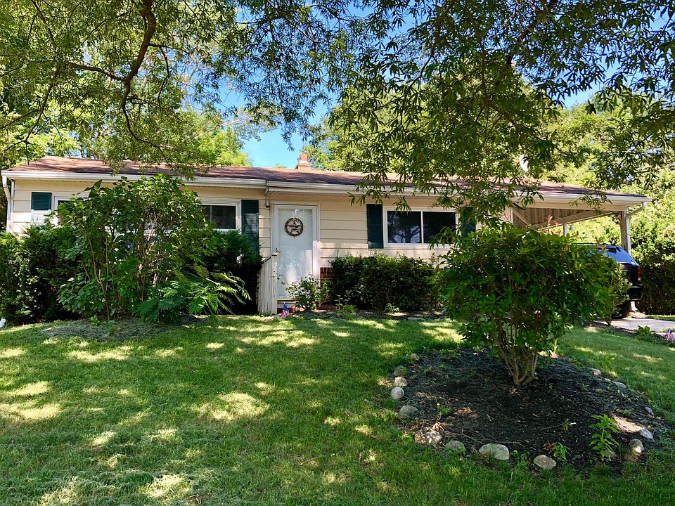 Front of the home with lots of shade