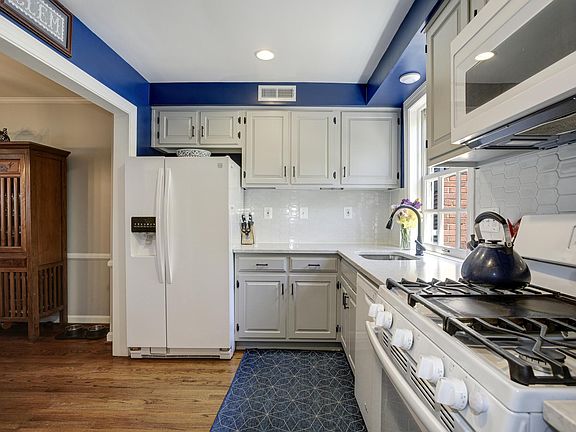 Recently renovated kitchen packed with storage-saving customizations