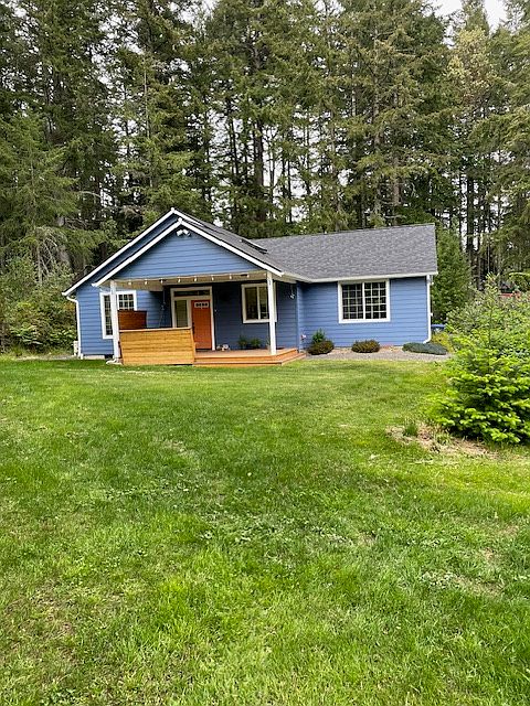 875sf home with 228sf porch and small grassy yard. Steps away from trails to parks and Grand Forest.