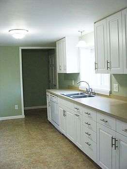 The kitchen has been replaced over the last 4 years.The microwave and dishwasher are brand new in 2013. The stove and refrigerator are newer.