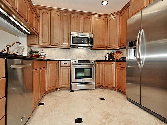 A chefs paradise! Brand New Top of the line counter depth SS KitchenAid Fridge