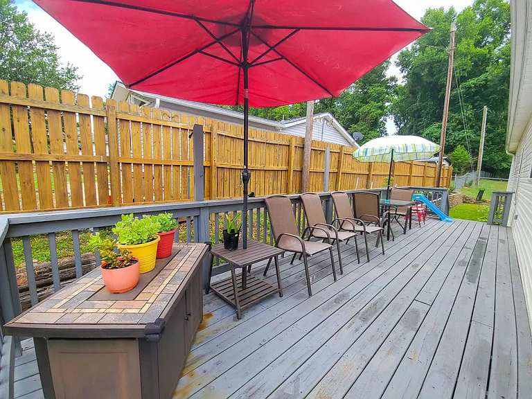 Ample patio space to enjoy the mountain weather. The plants sit atop a propane fire pit for you to easily enjoy during the cool mountain evenings.