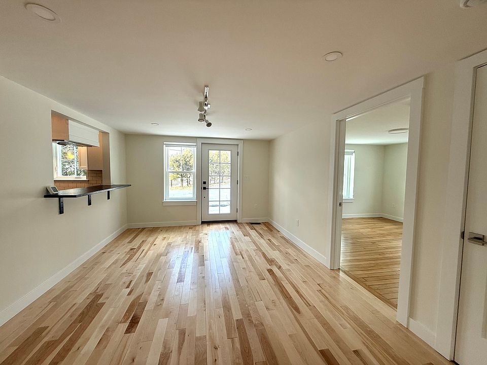 Dining Area with pass-thru to kitchen and patio door to backyard