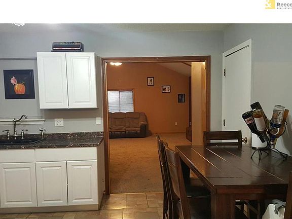 View from the living room thru kitchen into the huge family room
