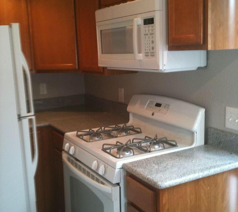 Gas stove, full size refrigerator,