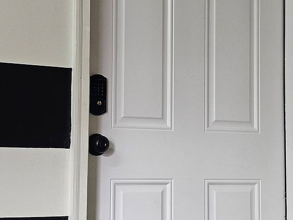 Private entrance through garage.