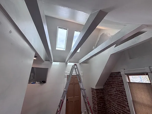 a work in progress but will be dialed in before 6/1. master bedroom vaulted ceiling and door to walk in closet