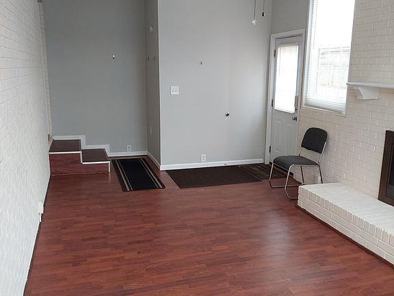 Door one enters from the parking area. One end of the sunroom which can be used as an exercise room, a crafts room, etc.