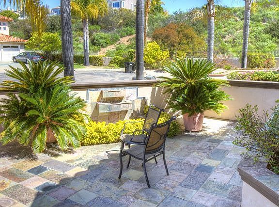 Gated Stone Entry Courtyard
